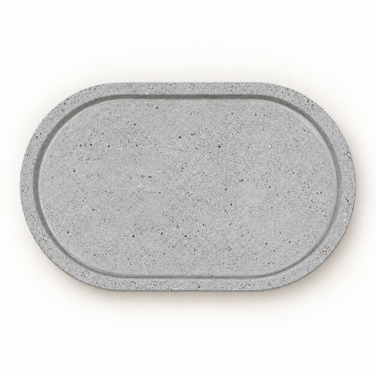 Oval concrete coaster in natural concrete – horizontal top view