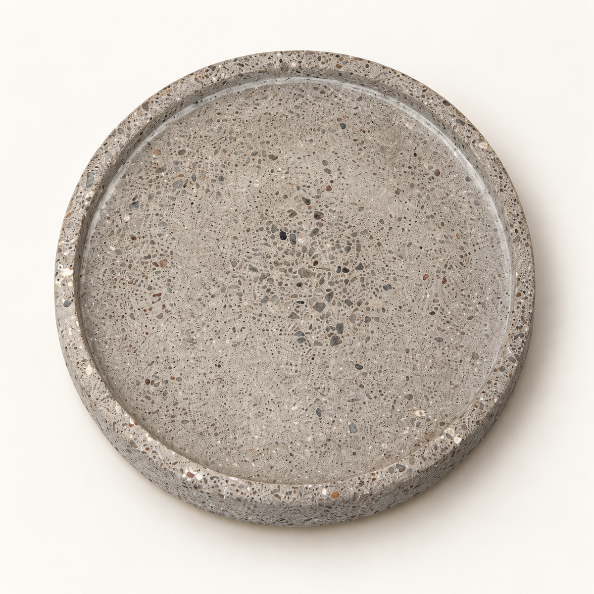 Round concrete coaster, Ø 10 cm, natural concrete – studio view