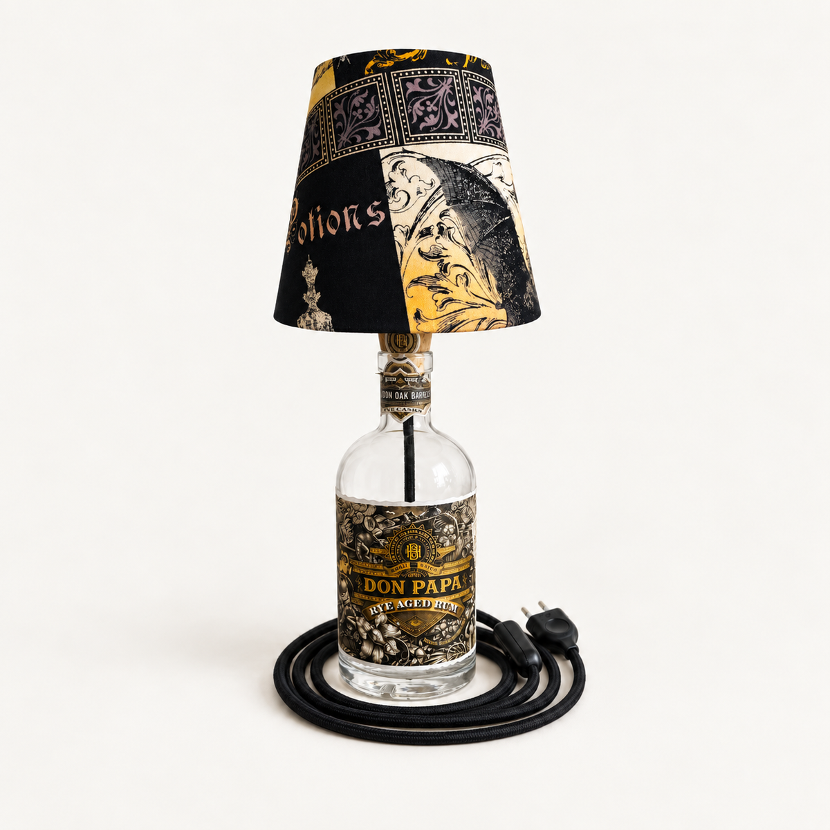 Don Papa Rye Aged bottle lamp, size S, with ornamental fabric shade and black fabric-covered cord