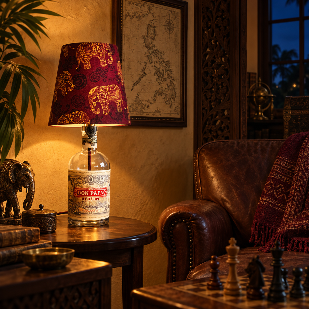 Don Papa Rum bottle lamp with elephant shade switched on in a collector’s salon at night