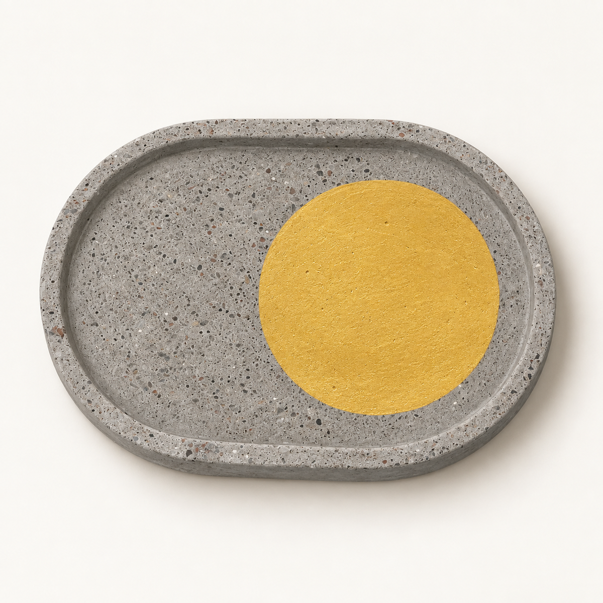 Oval concrete coaster, 15.5 × 11 cm, design 5 – studio view