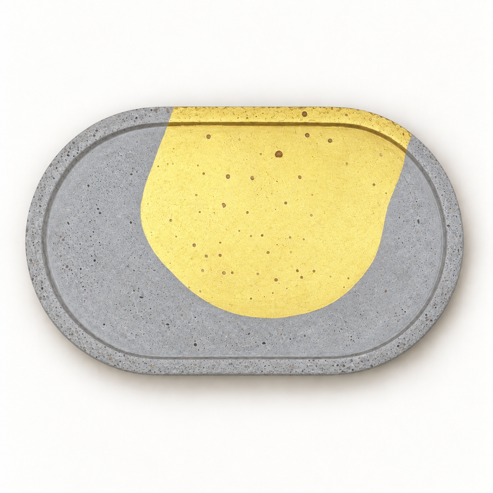 Beton-Untersetzer oval mit goldfarbenem Bogen – waagrechte Draufsicht