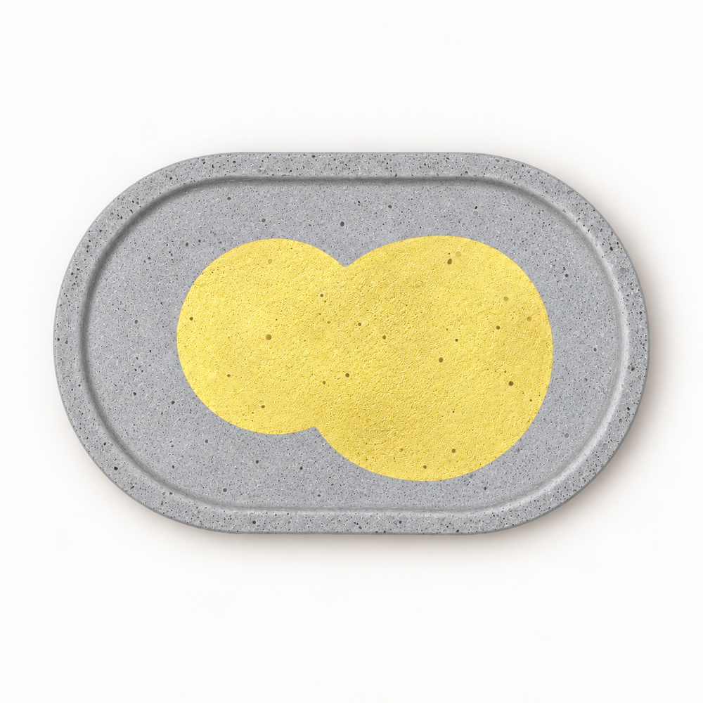 Beton-Untersetzer oval mit goldfarbenem Doppelkreis – waagrechte Draufsicht