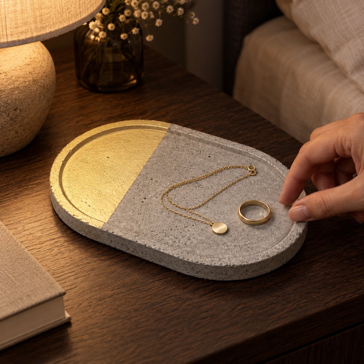 Oval concrete coaster – natural concrete – shown in use