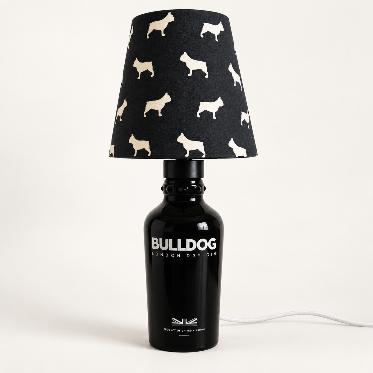 Bulldog London Dry Gin bottle lamp, size S, with dark bulldog-print shade and white fabric-covered cord – product photo
