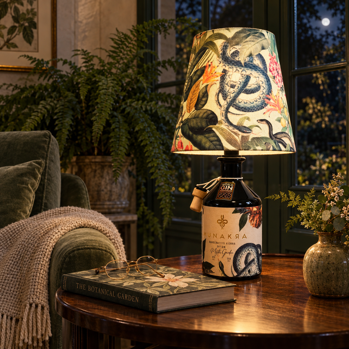 Munakra Mystic Garden bottle lamp switched on in a Viennese garden room at night