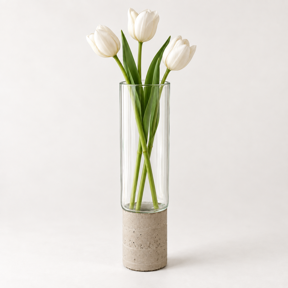 Glass-and-concrete vase – clear glass, tall cylinder with floral arrangement – decor not included