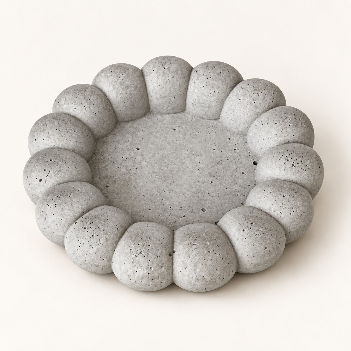 Large ribbed concrete coaster – natural finish – angled view